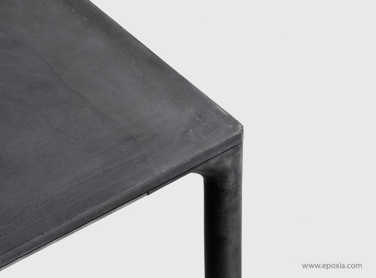 Détail angle de table finition béton Boiacca, pieds béton