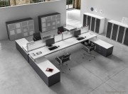 Bureau Zefiro 4 postes, sans aucun pied visible 