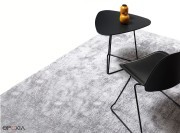 Chaise Kire, pied luge et tapissée cuir