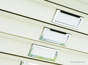Détail porte-étiquettes meuble à plans