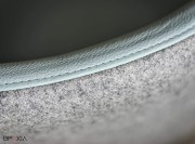 Détail assise et dos en cuir et tissu