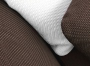 Détail du tissu Glad, à la texture agréable adapté à une utilisation en intérieur et extérieur.
