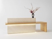 Banque d'accueil Kyo : lignes et matières intemporelles, avec éclairage leds