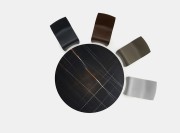 S Table, structure en S moulé en Ceramilux ®, plateau marbre Sahara noir mat.
